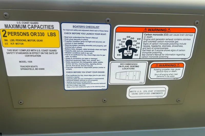 Slide: The Image of Safety and capacity labels on 2026 Tracker Grizzly 10 Jon boat. - 11