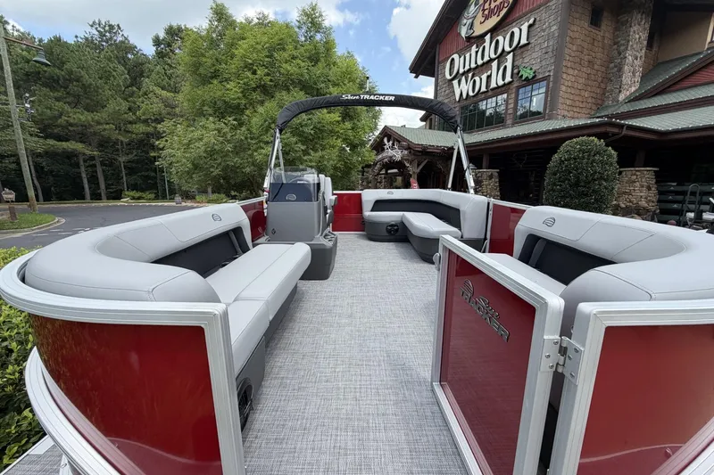 Slide: The Image of 2026 Sun Tracker Party Barge 16 DLX pontoon boat at Outdoor World store. - 7