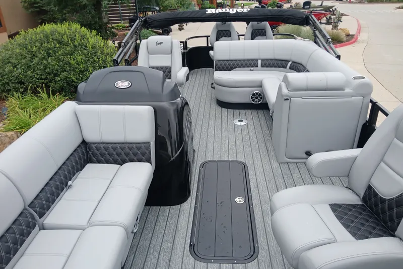 Slide: The Image of 2026 Ranger 223FC boat interior with luxurious gray seating and modern design. - 4