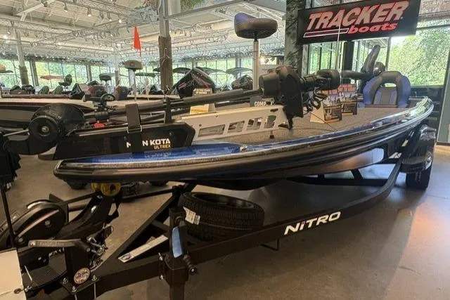 Slide: The Image of 2026 Nitro Z20 XL Pro boat displayed in showroom with Tracker Boats signage. - 2