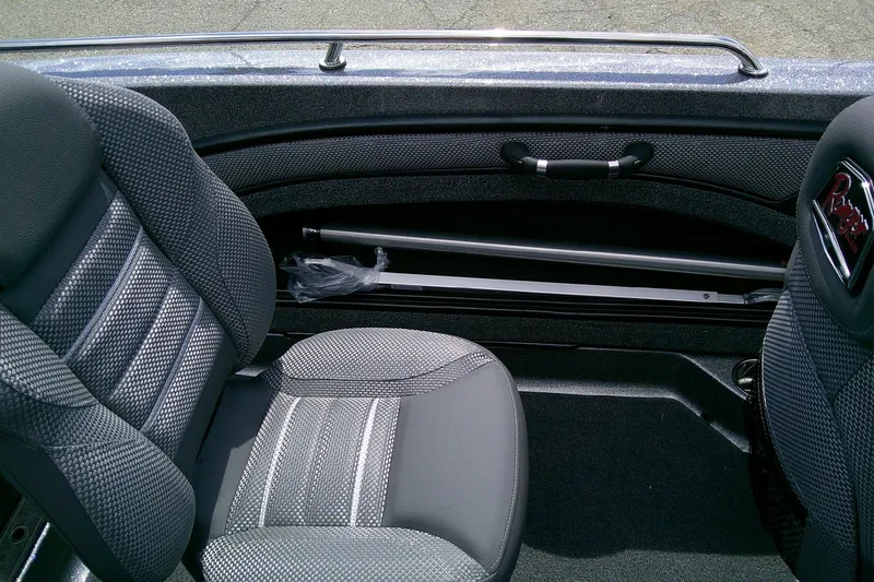 Slide: The Image of Interior of 2026 Ranger 1880MS boat with gray seating and storage compartment. - 87