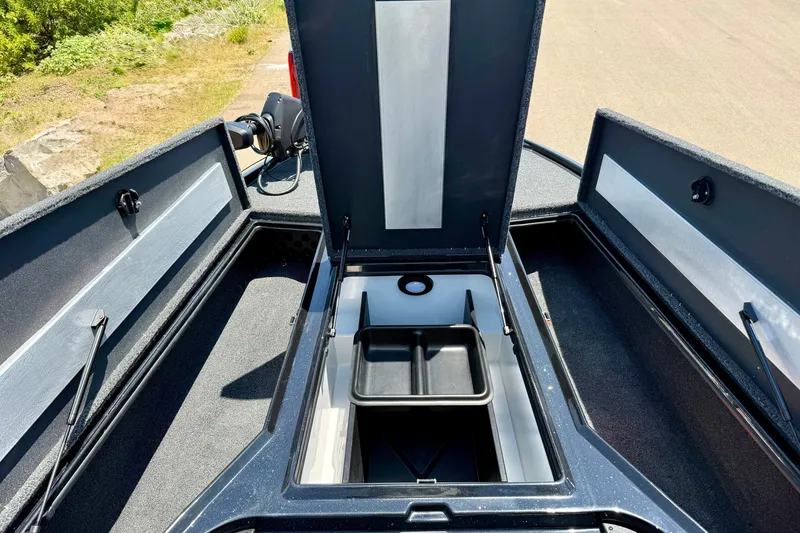 Slide: The Image of Open storage compartments on a 2026 Nitro Z20 XL Pro boat. - 12