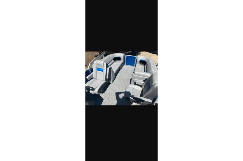 Slide: The Image of 2026 Sun Tracker Party Barge 22 XP3 interior with spacious seating and modern design. - 31