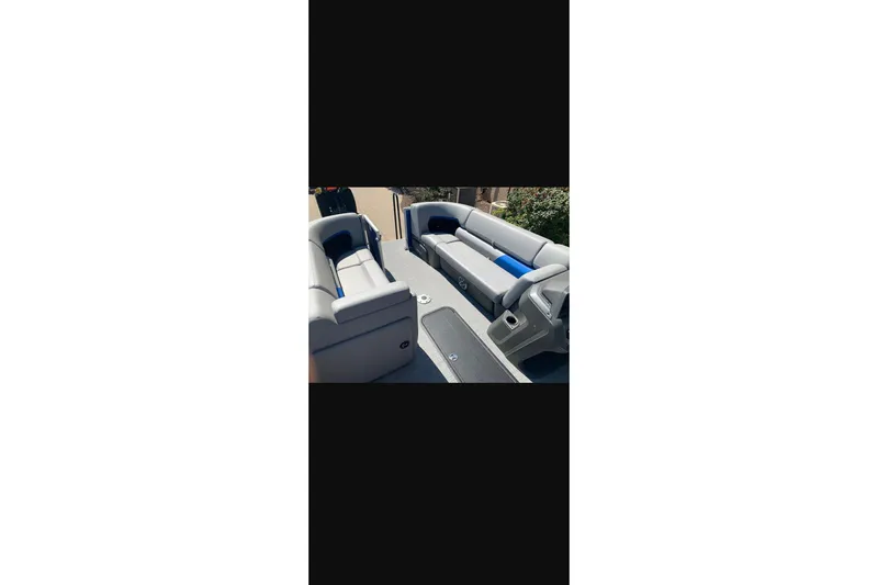 Slide: The Image of 2026 Sun Tracker Party Barge 22 XP3 interior with spacious seating and modern design. - 32