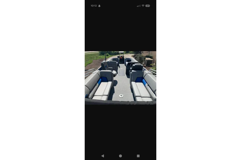 Slide: The Image of 2026 Sun Tracker Party Barge 22 XP3 interior with spacious seating and modern design. - 27