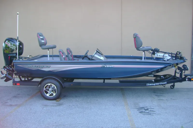 The Image of 2026 Ranger RT188P fishing boat on trailer, side view, blue color. - 0