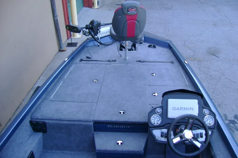 Slide: The Image of 2026 Ranger RT188P boat interior with Garmin navigation system and fishing seat. - 5