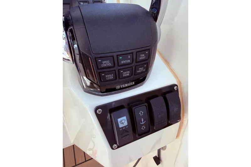 Slide: The Image of Control panel of a 2021 World Cat 400 DC-X boat featuring Yamaha controls. - 34