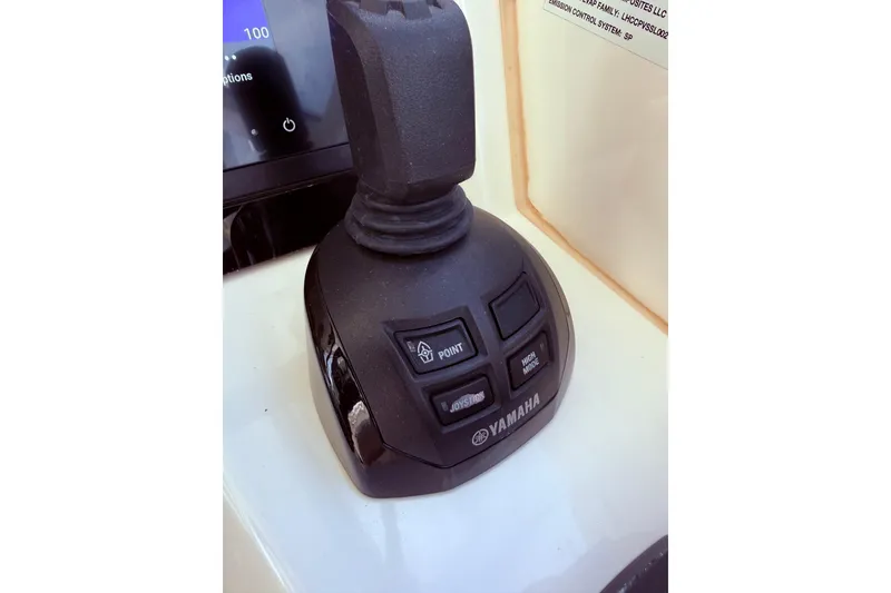 Slide: The Image of Yamaha joystick control on 2021 World Cat 400 DC-X boat dashboard. - 35
