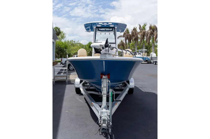 Slide: The Image of 2026 Sportsman Masters 247 Bay Boat on trailer, parked outdoors. - 12