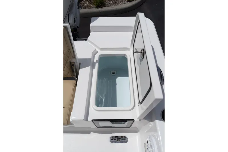 Slide: The Image of Open storage compartment on 2026 Sportsman Masters 247 Bay Boat. - 16