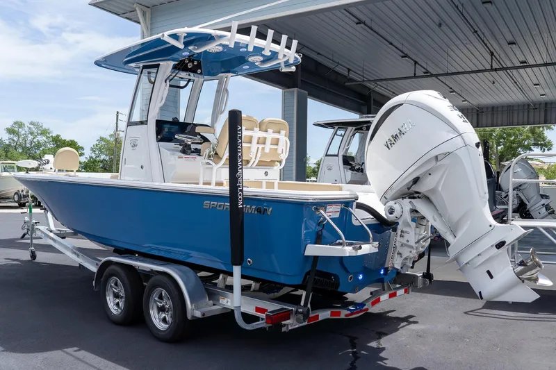 Slide: The Image of 2026 Sportsman Masters 247 Bay Boat with Yamaha engine on trailer. - 2