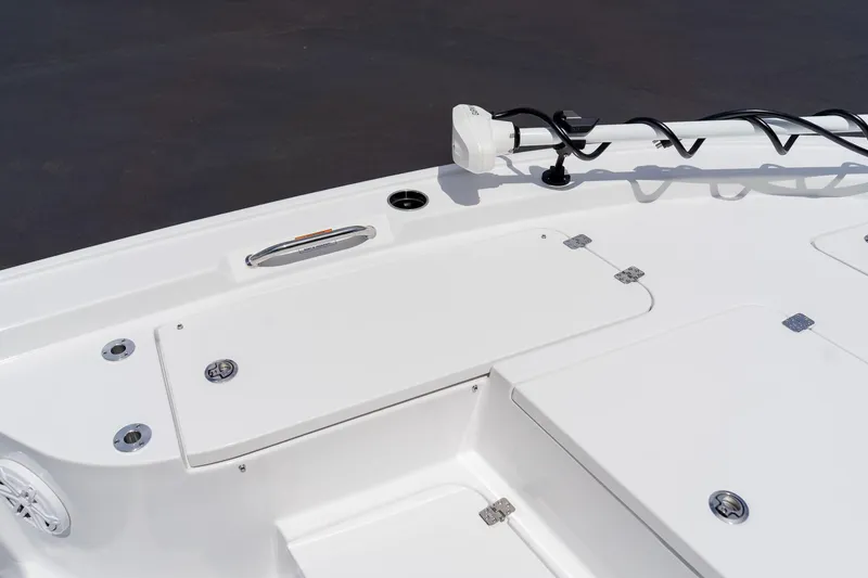 Slide: The Image of 2026 Sportsman Masters 247 Bay Boat deck with storage compartments and trolling motor. - 31