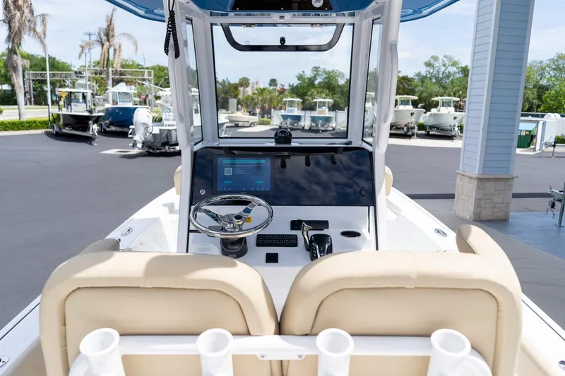 Slide: The Image of 2026 Sportsman Masters 247 Bay Boat cockpit with modern steering and controls. - 37