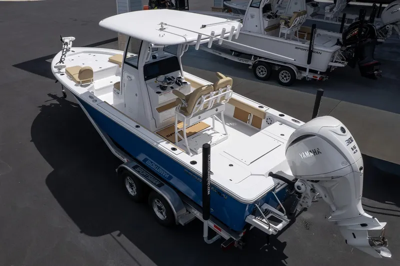 Slide: The Image of 2026 Sportsman Masters 247 Bay Boat with Yamaha engine on trailer, side view. - 4