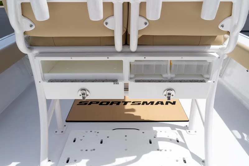 Slide: The Image of 2026 Sportsman Masters 247 Bay Boat interior with storage compartments and seating. - 40