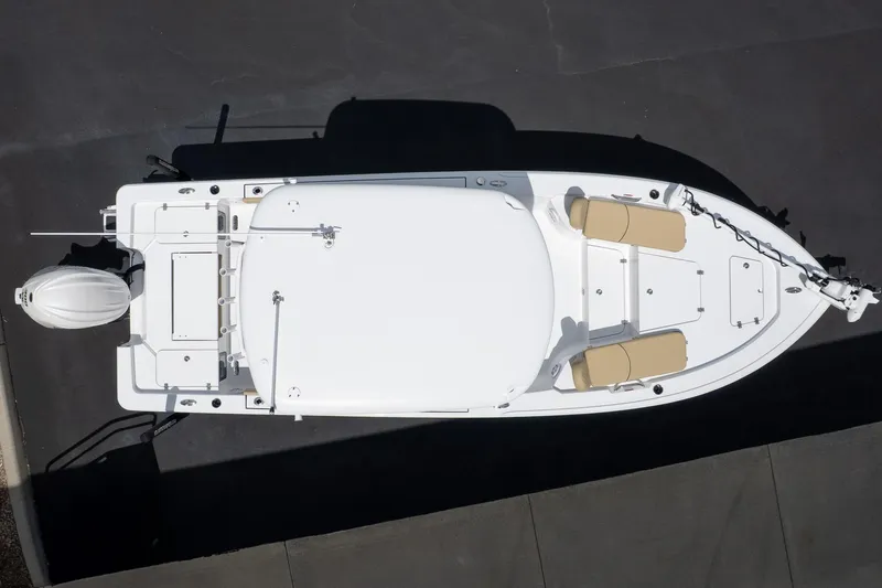 Slide: The Image of Overhead view of 2026 Sportsman Masters 247 Bay Boat on a dark surface. - 8