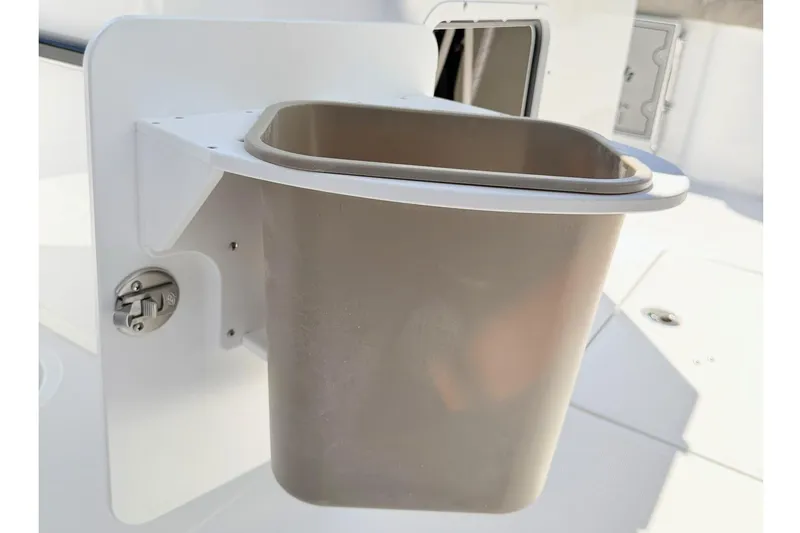Slide: The Image of Trash bin on 2026 Sea Hunt Gamefish 30 Forward Seating boat deck. - 13
