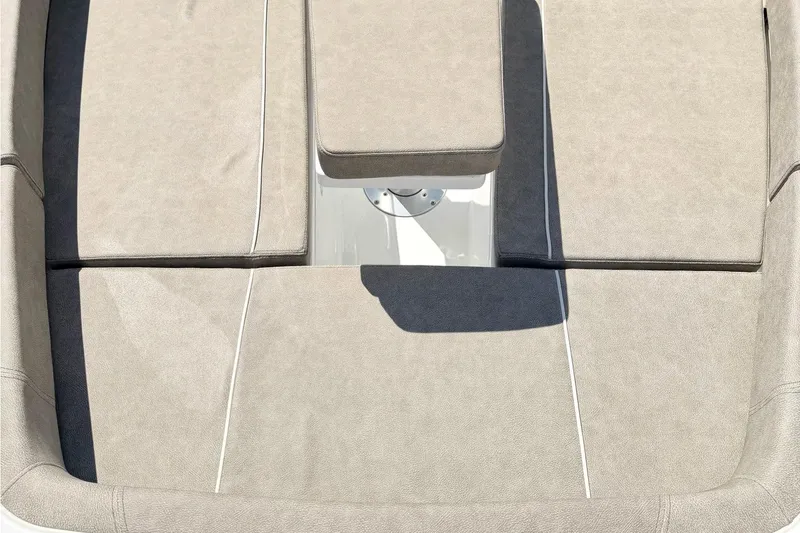 Slide: The Image of 2026 Sea Hunt Gamefish 30 Forward Seating, beige cushioned boat interior. - 23