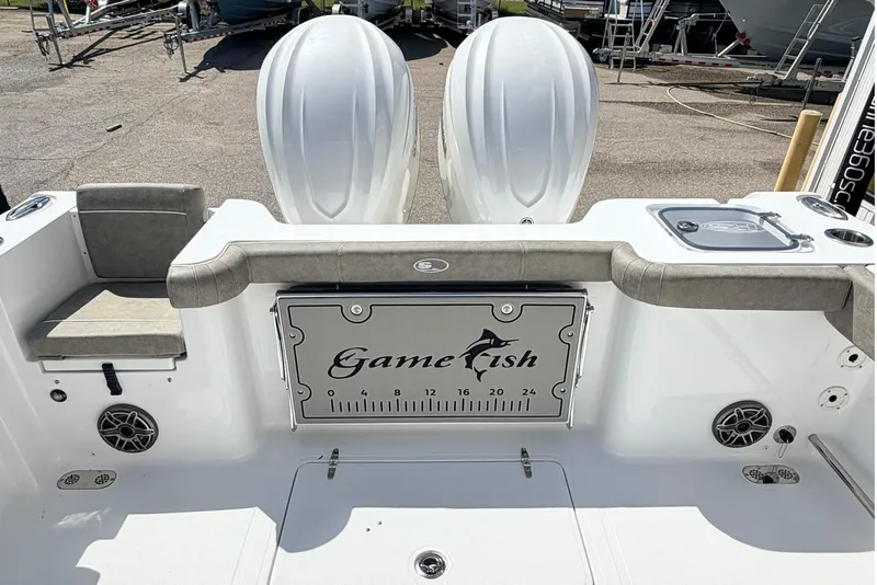 Slide: The Image of 2026 Sea Hunt Gamefish 30 Forward Seating boat with dual engines and spacious deck layout. - 3
