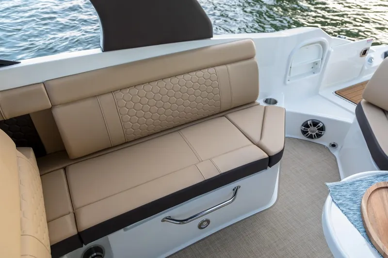 Slide: The Image of Manufacturer Provided Image: 2019 Sea Ray SDX 270 boat interior with tan leather seating. - 14