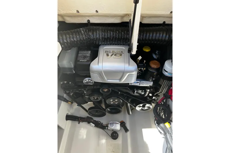 Slide: The Image of Engine compartment of a 2019 Sea Ray SDX 270 with Big Block V8 engine. - 18