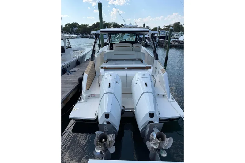 Slide: The Image of 2026 Tiara Yachts 39 LS with dual engines docked at marina. - 10