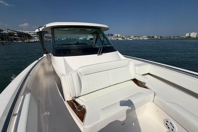 Slide: The Image of 2026 Tiara Yachts 39 LS boat on water, featuring sleek design and comfortable seating. - 5