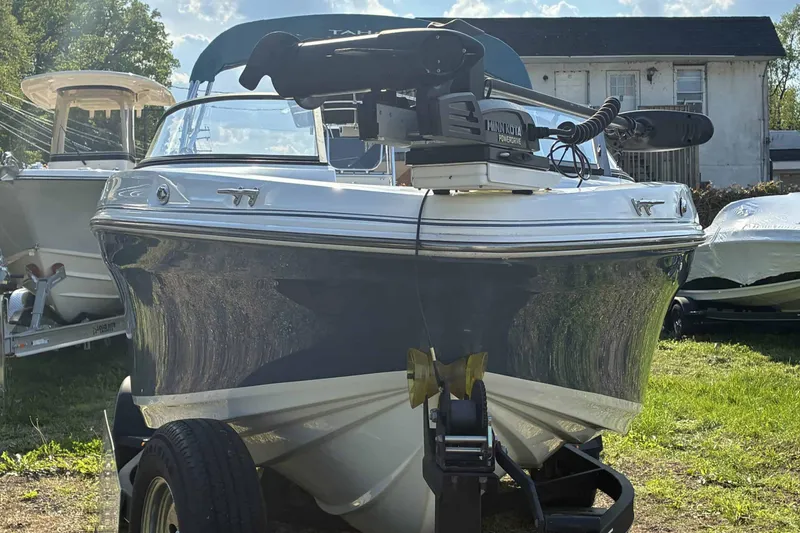 The Image of 2021 Tahoe 500 TF boat on trailer, parked outdoors under a sunny sky. - 0