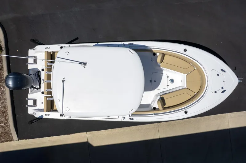Slide: The Image of Overhead view of 2026 Sportsman Heritage 231 Center Console boat on pavement. - 10