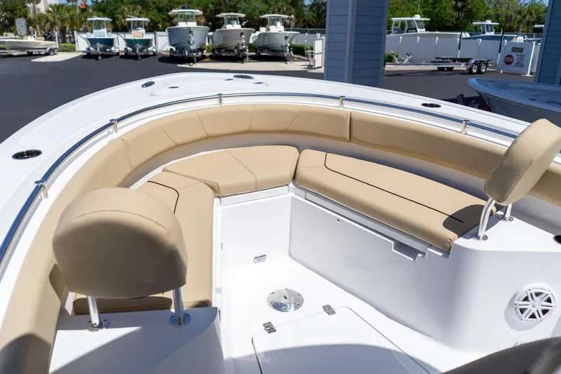 Slide: The Image of 2026 Sportsman Heritage 231 Center Console boat with beige seating and sleek design. - 21