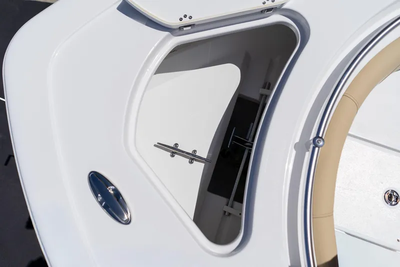 Slide: The Image of 2026 Sportsman Heritage 231 Center Console boat storage compartment detail. - 28