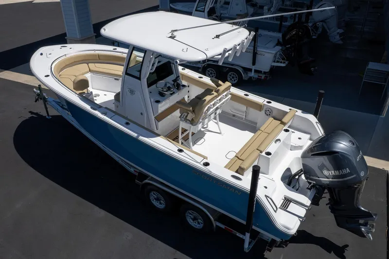 Slide: The Image of 2026 Sportsman Heritage 231 Center Console boat with Yamaha engine, featuring spacious seating and sleek design. - 7