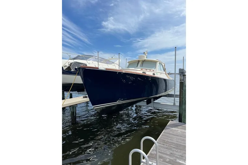 Slide: The Image of 2001 Hinckley Picnic Boat 36 Classic docked on a sunny day. - 20