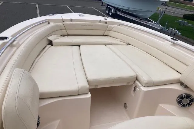 Slide: The Image of 2023 Grady-White Fisherman 236 boat with spacious cushioned seating area. - 6