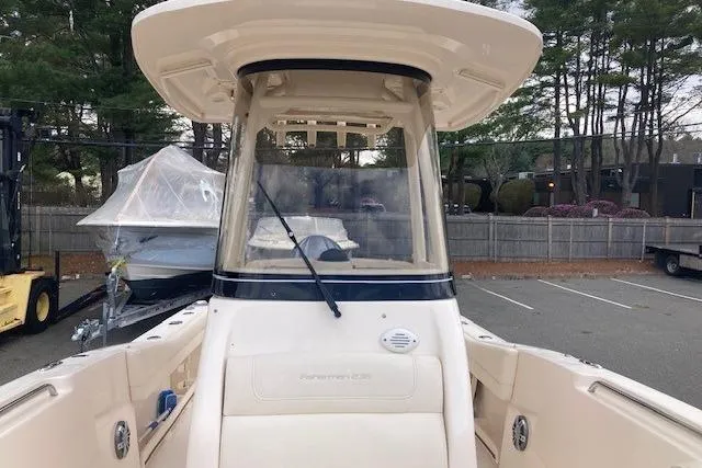 Slide: The Image of 2023 Grady-White Fisherman 236 boat, front view in a parking area. - 7