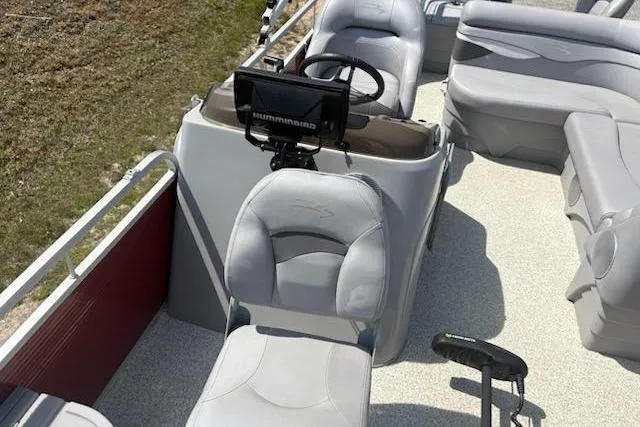 Slide: The Image of 2020 Bennington SV 188 SFV pontoon boat interior with steering console and seating. - 10