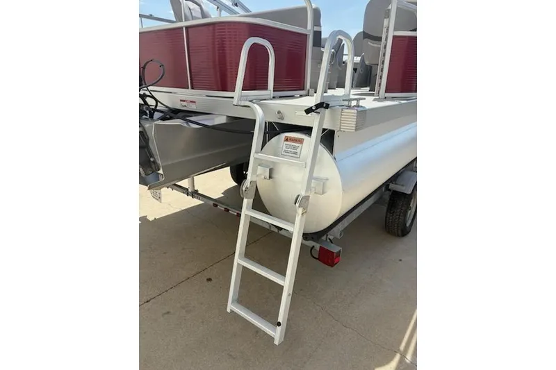 Slide: The Image of 2020 Bennington SV 188 SFV 8' Narrow Beam pontoon boat with ladder on trailer. - 5