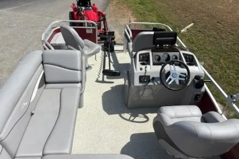 Slide: The Image of 2020 Bennington SV 188 SFV 8' Narrow Beam pontoon boat interior with gray seating and steering console. - 7