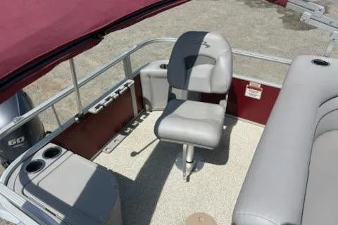 Slide: The Image of 2020 Bennington SV 188 SFV 8' Narrow Beam boat interior with seating and cup holders. - 9