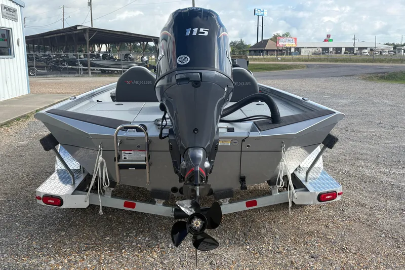 Slide: The Image of 2026 Vexus Defender 189 boat with powerful outboard motor on trailer. - 4