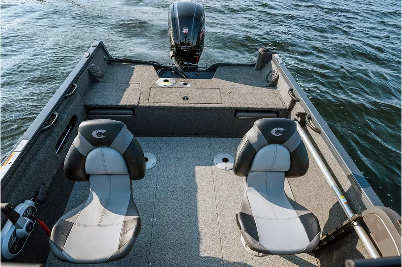 Slide: The Image of Manufacturer Provided Image: 2026 Crestliner 1750 Hawk WT boat interior with two seats on a lake. - 5