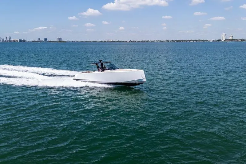 Slide: The Image of 2022 Pardo Yachts 38 cruising on open water, showcasing sleek design and luxury features. - 14