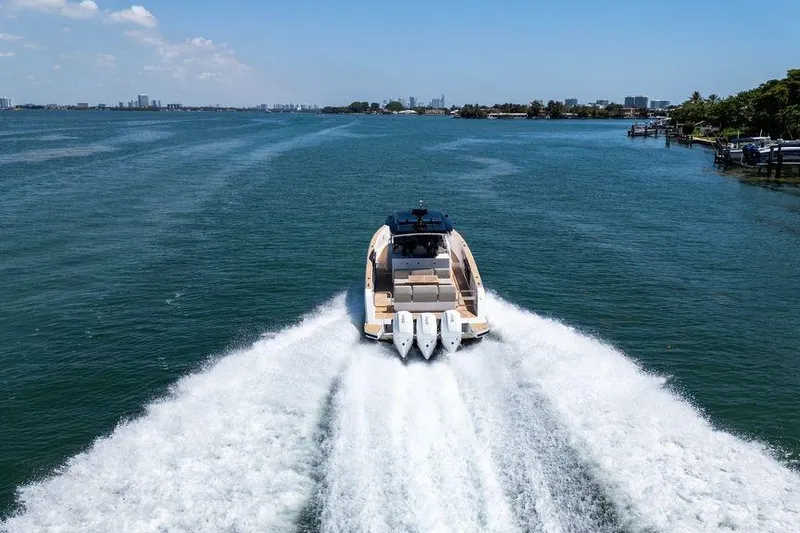 Slide: The Image of 2022 Pardo Yachts 38 cruising on calm waters, showcasing sleek design and powerful engines. - 17