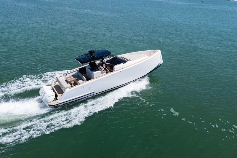 Slide: The Image of 2022 Pardo Yachts 38 cruising on calm waters near urban skyline. - 18