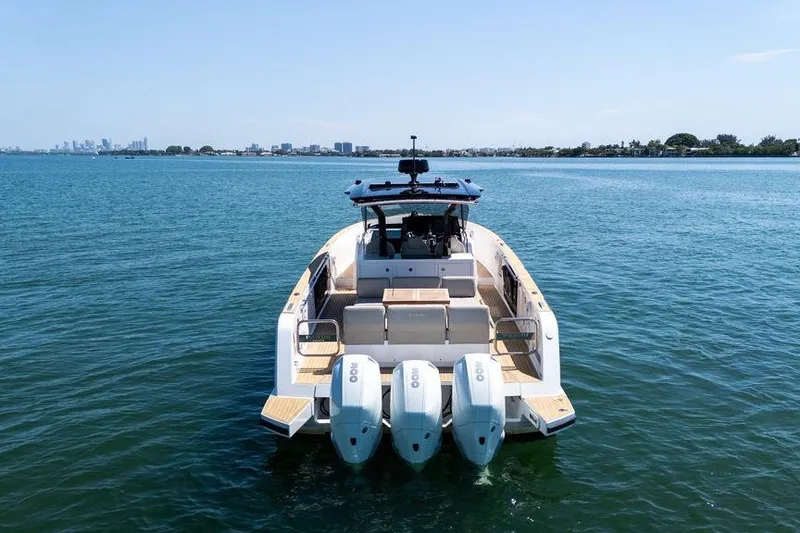 Slide: The Image of Pardo Yachts 38, 2022 model, cruising on a sunny day with clear blue skies. - 28