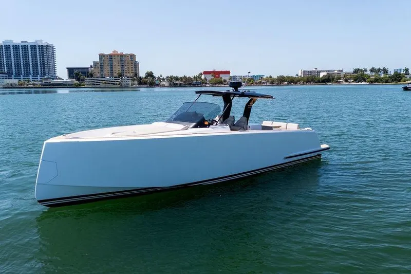 Slide: The Image of Luxurious 2022 Pardo Yachts 38 with elegant seating, cruising on serene waters. - 30
