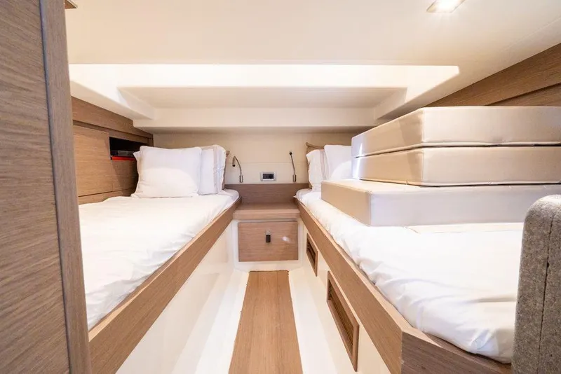 Slide: The Image of Helm of 2022 Pardo Yachts 38 with navigation screens and controls. - 35