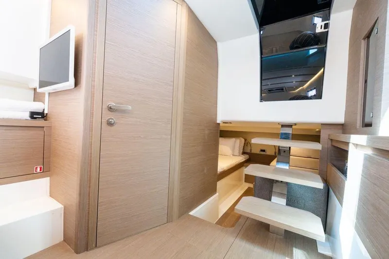 Slide: The Image of 2022 Pardo Yachts 38 interior with waterfront cityscape view. - 36