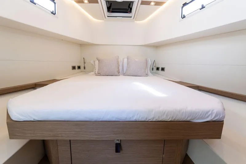 Slide: The Image of Luxurious 2022 Pardo Yachts 38 cockpit with plush seating and modern controls, overlooking serene waters. - 37